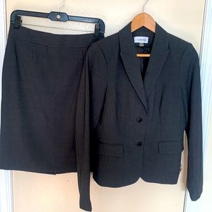 Calvin Klein elevate your professional style with this elegant suit. Brand New!